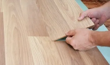 Laminate flooring installation | Johnston Paint & Decorating