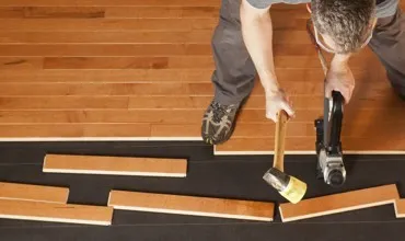 Hardwood flooring installation | Johnston Paint & Decorating